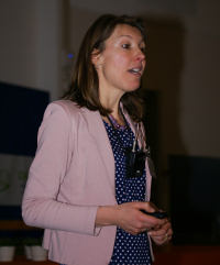 Photo of Annemie Bogaerts presenting a plenary lecture on ICP-MS modeling 