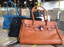 photo of some handbags made from leather